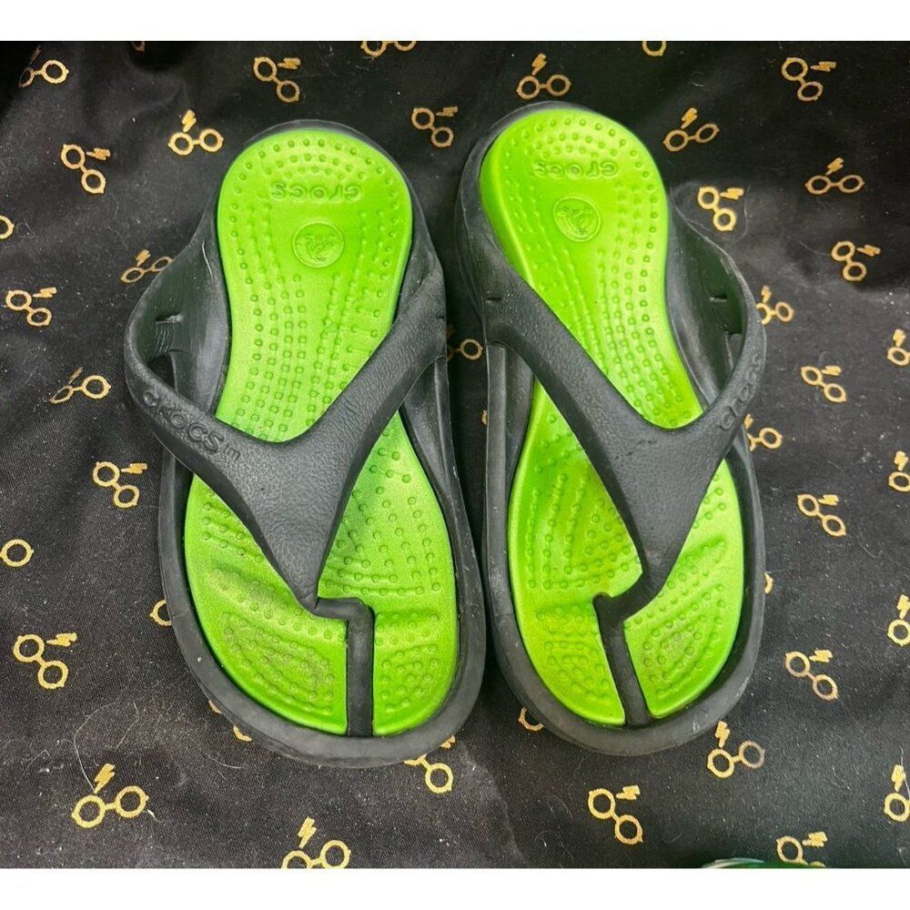 Crocs size 10 11 green and black flip flop sandals